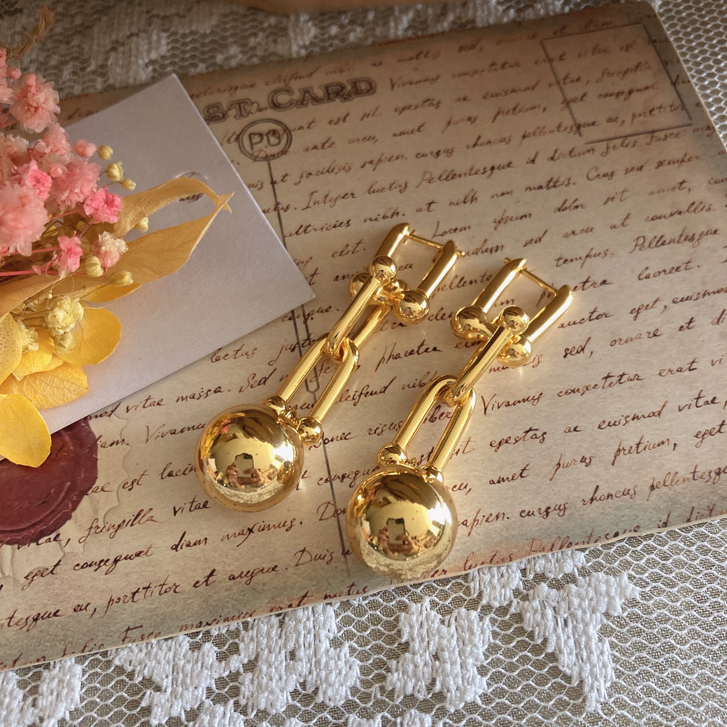 S.L.A. Kendall ball earrings