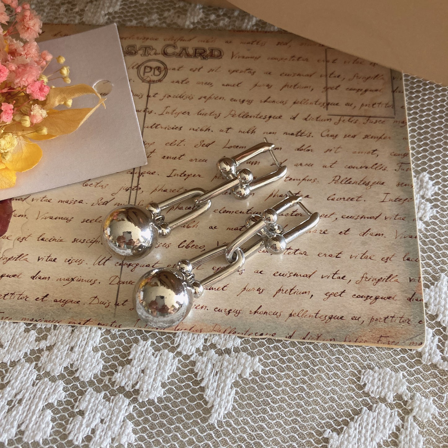 S.L.A. Kendall ball earrings